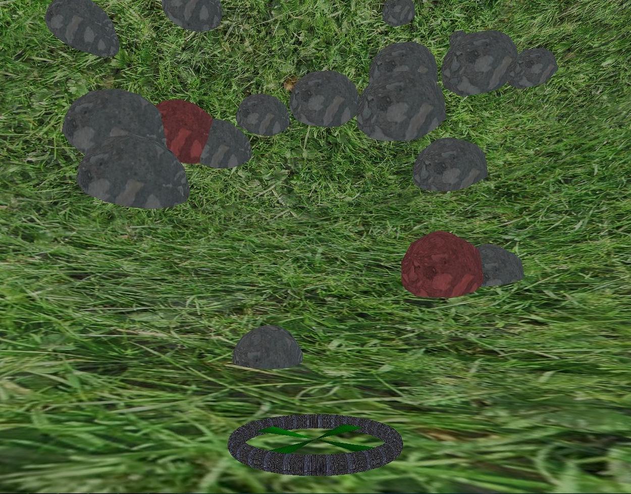 Hier sieht man die Asteroiden in rot wie sie hinunterfallen. Sobald sie im Boden versunken sind werden sie grau und sind neue Hindernisse.